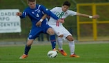 Axel Andresson of Iceland grapples with Hugo Neto during Portugal's 3-0 Group 7 victory