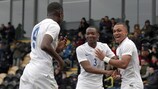 Ike Ugbo, Adetayo Edun and Layton Ndukwu celebrate during England's win against Norway