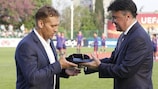 Stiliyan Petrov receives his UEFA award from Borislav Mihaylov