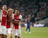 Ajax's Kasper Dolberg (centre) is congratulated after equalising against PAOK