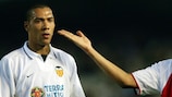 Valencia's John Carew (left) with Thierry Henry of Arsenal