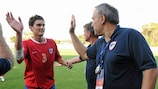 Stefan Dabetić celebrates Belgrade's victory with coach Jovica Milikić