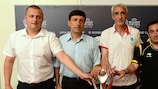 Vitali Zhukovski, Vladimir Aleshkin, Krassimir Manolov and Toni Almenderos touch the trophy