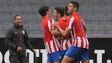 Atlético celebrate one of their three goals against Austria Wien