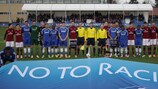 Referees and teams at the Chelsea FC v AC Milan round of 16 match