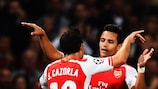 Arsenal match winner Alexis Sánchez takes the plaudits from Santi Cazorla