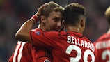 Stefan Kiessling is congratulated by Karim Bellarabi after scoring one of his two goals for Leverkusen