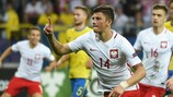 Dawid Kownacki celebrates his equaliser for Poland against Sweden on Monday