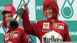 Michael Schumacher celebrates after winning the 2000 Malaysian Grand Prix