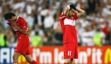 Tümer Metin holds his head after Turkey's late loss