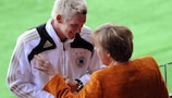 Angela Merkel lays down the law to Bastian Schweinsteiger