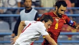 Montenegro match-winner Mirko Vučinić takes on Wales' Chris Gunter