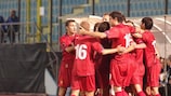 Moldova players celebrate their 2-0 victory in San Marino