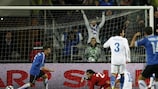 Estonia celebrate scoring against Italy