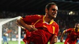 Andrija Delibašić headed a late equaliser to earn Montenegro a play-off spot