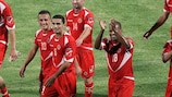 Malta celebrate gaining their first Group F point against Georgia