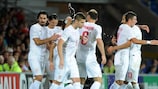 Serbia celebrate after Aleksandar Kolarov doubled their advantage