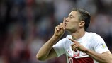 Robert Lewandowski enjoys the moment after hitting Poland's equaliser