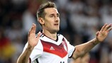 Miroslav Klose celebrates becoming Germany's all-time leading scorer