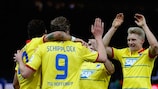Sven Schipplock é felicitado pelo companheiros após marcar o quarto golo do Hoffenheim na visita ao Hertha