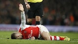 Jack Wilshere after sustaining his injury against United