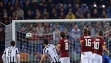Carlos Tévez gives Juventus the lead against ten-man Roma, who equalised through Seydou Keita