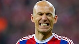 Arjen Robben winces in pain as he leaves the pitch on Tuesday night