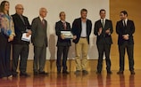 André Seabra receives an award from the Portuguese government for his UEFA-backed study into football and childhood obesity