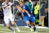 The Faroes' Odmar Faerø up against Finland's Teemu Pukki