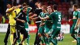 Rapid Wien, last in the group stage in 2005/06, celebrate their 3-2 victory over Ajax