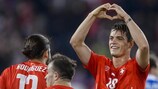 Granit Xhaka (right) is feeling the love in the Switzerland camp