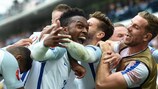 Daniel Sturridge is mobbed after scoring England's winner against Wales
