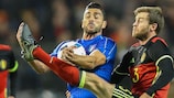 Italy's Graziano Pellè assailed by Belgian players