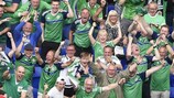 Northern Ireland's players celebrate with their supporters