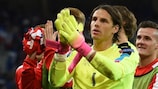 Yann Sommer leads Switzerland's celebrations after they qualified for the last 16