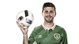 Shane Long familiarises himself with the tournament match ball