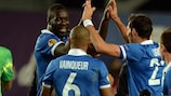 Dinamo Moskva players celebrate their victory against PSV