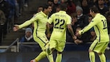 Luis Suárez is congratulated by Lionel Messi after scoring City's first