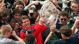 Otto Rehhagel lifts the Bundesliga trophy after promoted Kaiserslautern's 1997/98 success