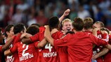 Leverkusen players celebrate at full time