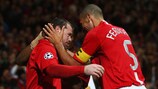 Wayne Rooney is congratulated by team-mate Rio Ferdinand