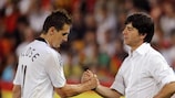 Germany coach Joachim Löw consoles Miroslav Klose after the defeat