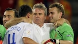 Guus Hiddink celebrates with goalkeeper Igor Akinfeev and Sergei Ignashevich