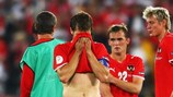 Os jogadores austríacos ficaram desolados após o afastamento