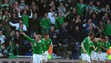 Northern Ireland players celebrate scoring in Poland; a win tonight would put them top of Group 3