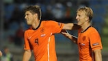 Klaas-Jan Huntelaar (left) has scored five goals in two Group E matches