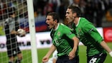 Corry Evans (right) celebrates scoring Northern Ireland's winner in Slovenia