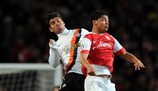 Shakhtar's Eduardo competes for a ball with his former Arsenal team-mate Denilson