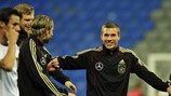 Germany's Lukas Podolski is all smiles in training ahead of the match against Kazakhstan