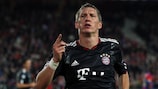 Bastian Schweinsteiger celebra o golo do triunfo